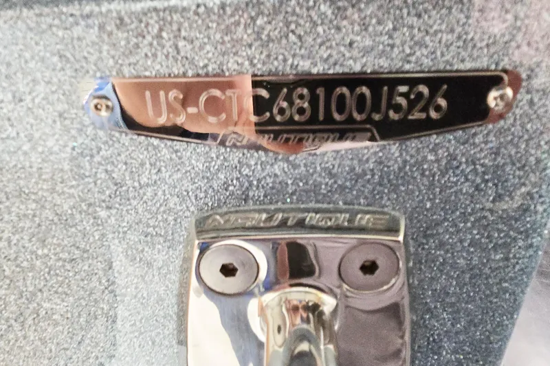 Slide: The Image of 2026 Nautique Super Air Nautique GS22 boat identification plate and hardware. - 6