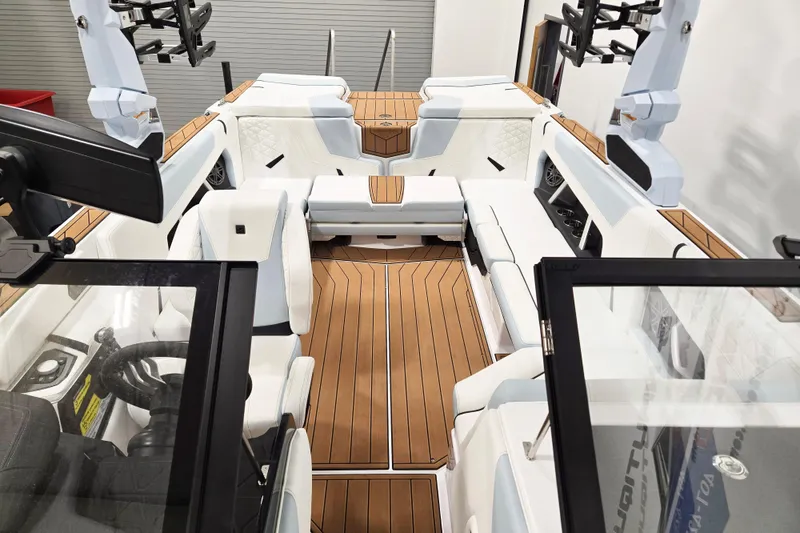 Slide: The Image of 2026 Nautique Super Air Nautique GS22 interior with luxurious seating and modern design. - 12
