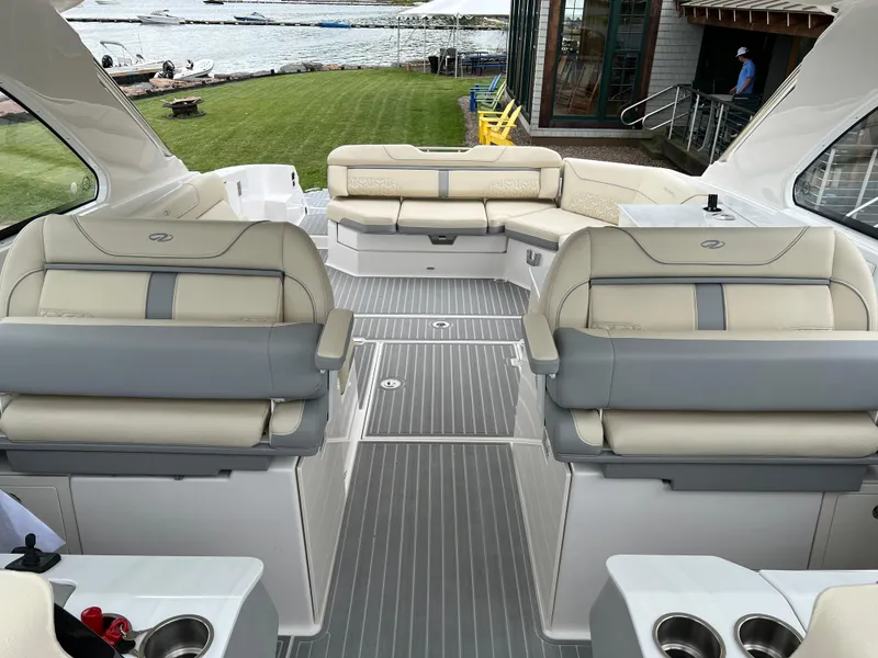 Slide: The Image of Luxurious 2022 Regal LS36 boat interior with plush seating and elegant design. - 47