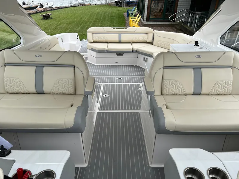 Slide: The Image of 2022 Regal LS36 boat interior with luxurious beige seating and modern design. - 48