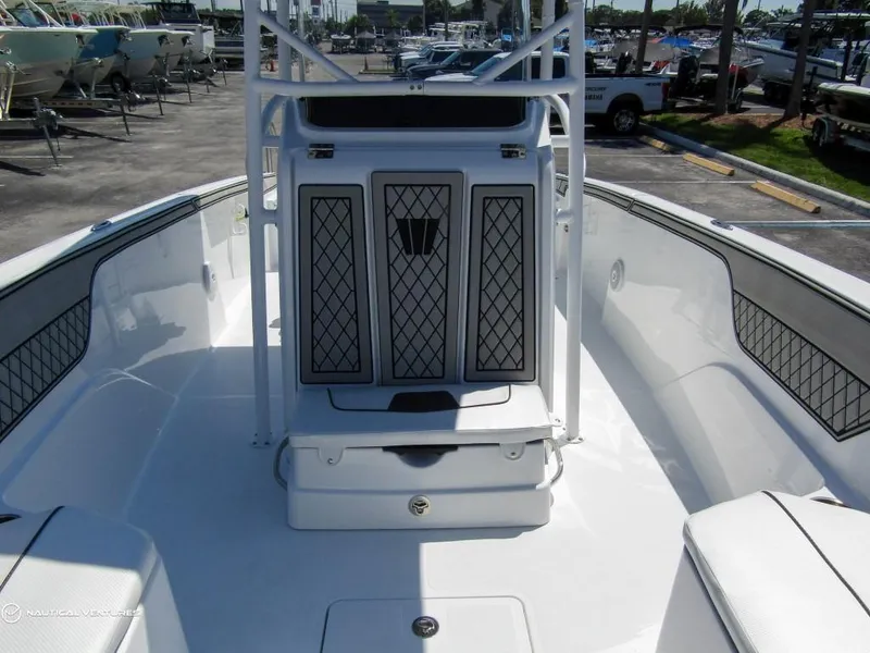 Slide: The Image of 2024 Wellcraft 202 Fisherman boat interior, front deck view. - 10
