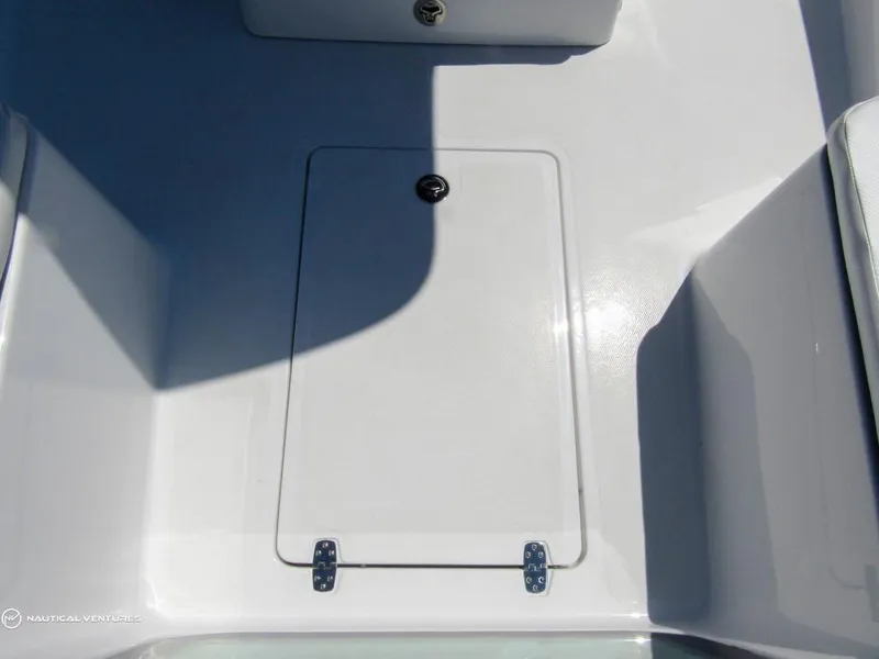 Slide: The Image of 2024 Wellcraft 202 Fisherman boat storage compartment. - 17