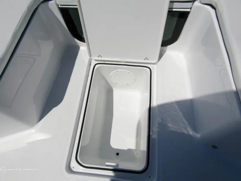 Slide: The Image of 2024 Wellcraft 202 Fisherman boat storage compartment. - 18