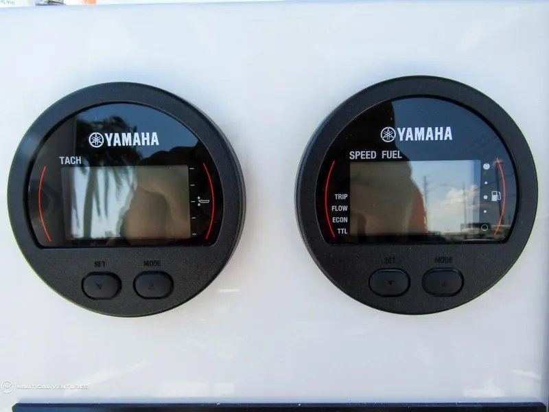 Slide: The Image of Yamaha tachometer and speed fuel gauges on 2024 Wellcraft 202 Fisherman boat. - 19