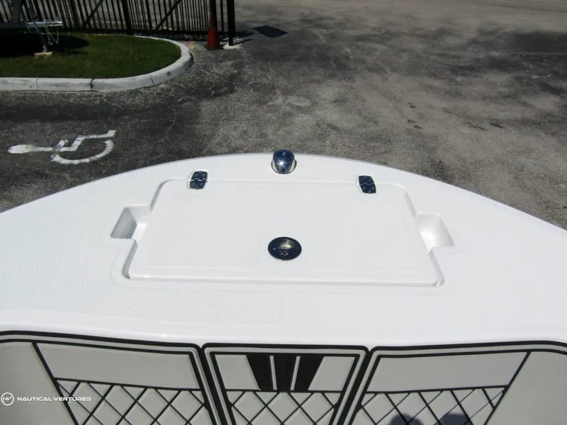 Slide: The Image of 2024 Wellcraft 202 Fisherman boat bow with storage compartment. - 4