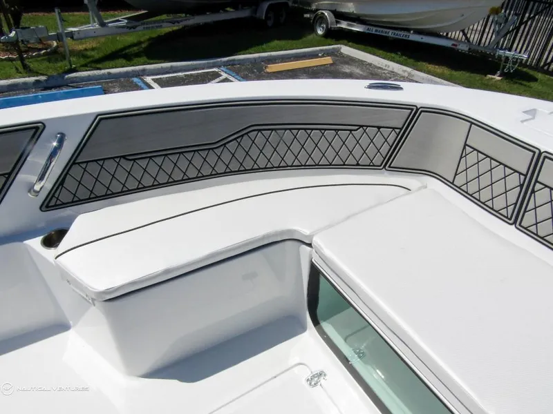 Slide: The Image of 2024 Wellcraft 202 Fisherman boat interior seating area. - 8