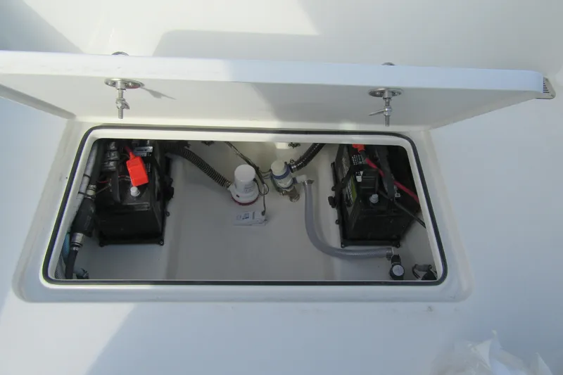 Slide: The Image of Battery compartment of 2026 Parker 227 Explorer Sport Cabin boat. - 19