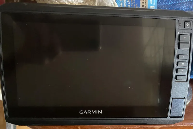 Slide: The Image of Garmin marine GPS device on 2013 Crestliner 16 SC boat dashboard. - 10