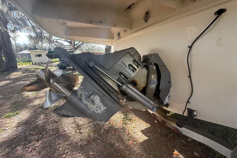 Slide: The Image of Interior cabin of 2004 Monterey 265 Cruiser with beige upholstery and carpeted flooring. - 23