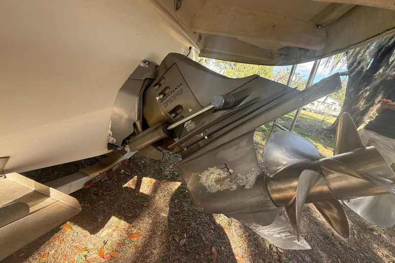 Slide: The Image of Interior of 2004 Monterey 265 Cruiser with control panels and wooden cabinet door. - 24