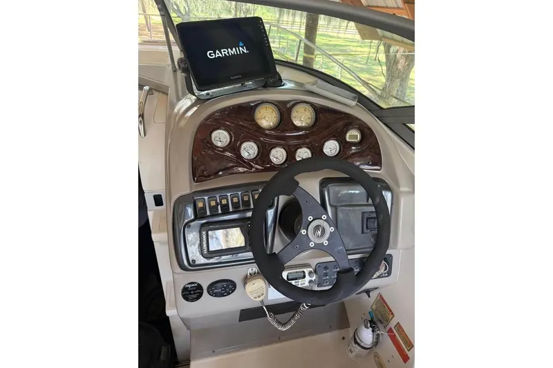 Slide: The Image of 2004 Monterey 265 Cruiser boat rear view with propeller and ladder, Clearwater Beach, FL. - 3
