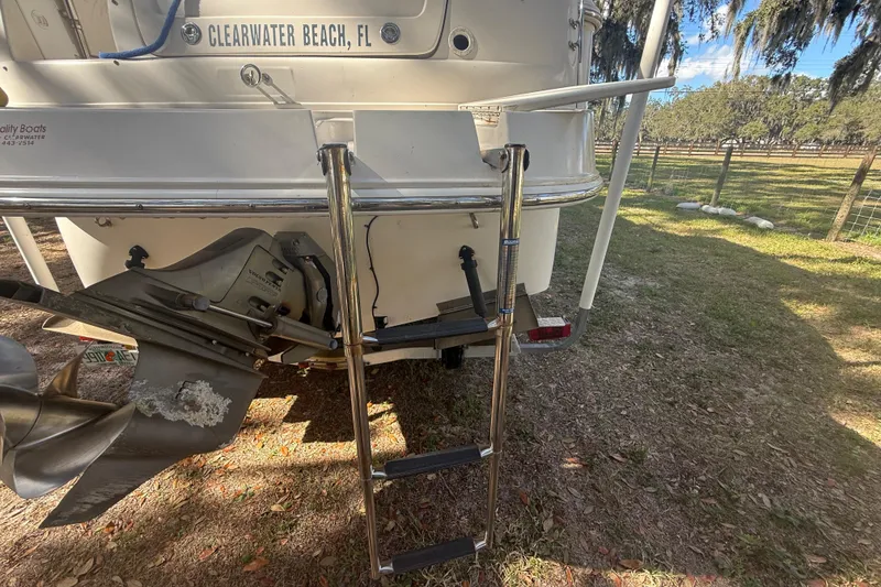 Slide: The Image of Control panel of a 2004 Monterey 265 Cruiser boat with switches and buttons. - 34