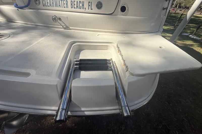 Slide: The Image of Control panel of a 2004 Monterey 265 Cruiser with radio and communication equipment. - 35