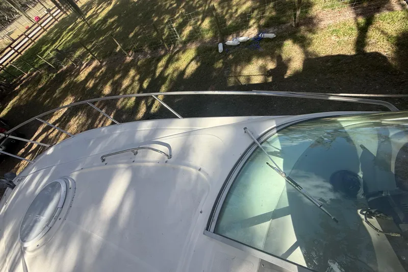 Slide: The Image of 2004 Monterey 265 Cruiser boat deck with railing, viewed from above. - 37