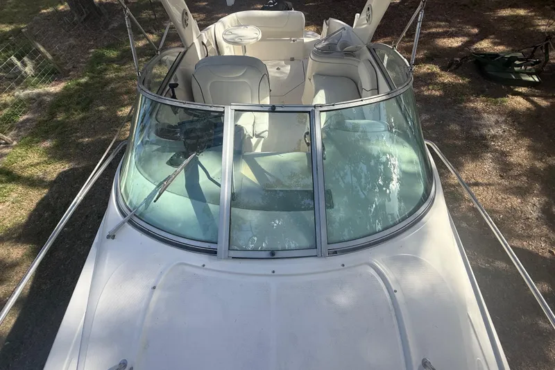 Slide: The Image of Bow view of 2004 Monterey 265 Cruiser boat with stainless steel railings. - 39