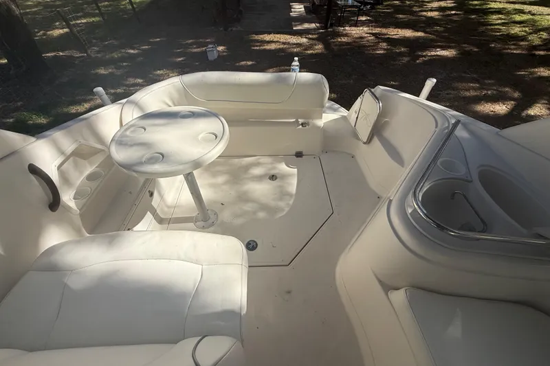 Slide: The Image of Trailer wheels of a 2004 Monterey 265 Cruiser on pavement. - 55