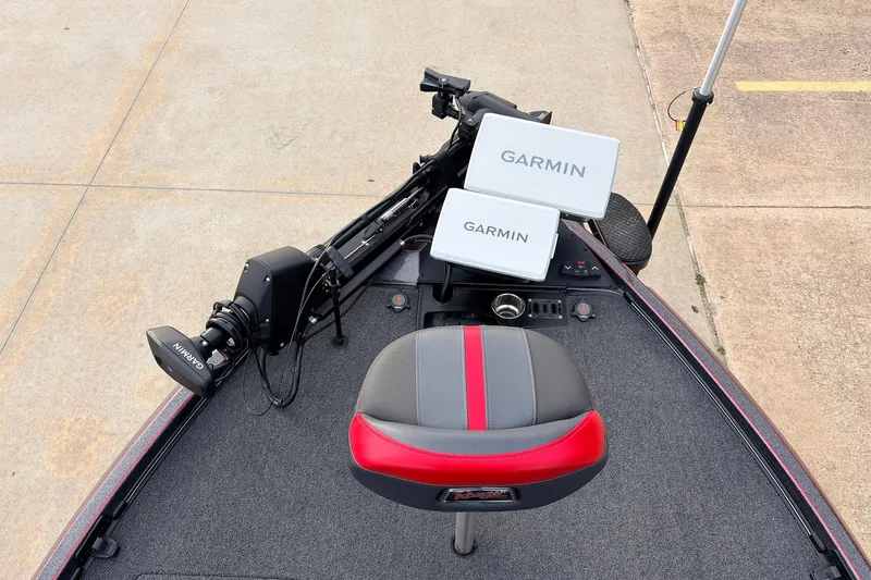 Slide: The Image of 2025 Ranger Z521R Cup-Equipped boat with Garmin electronics and red-accented seat. - 10