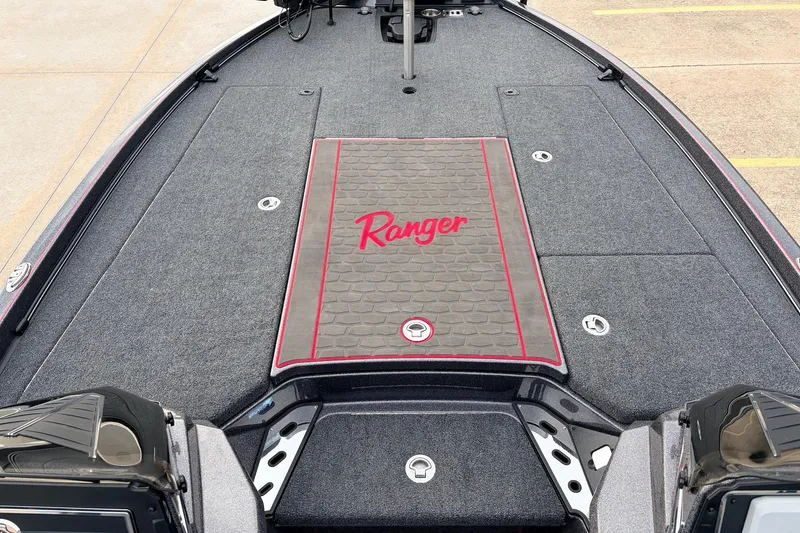 Slide: The Image of 2025 Ranger Z521R Cup-Equipped boat deck with logo and storage compartments. - 15