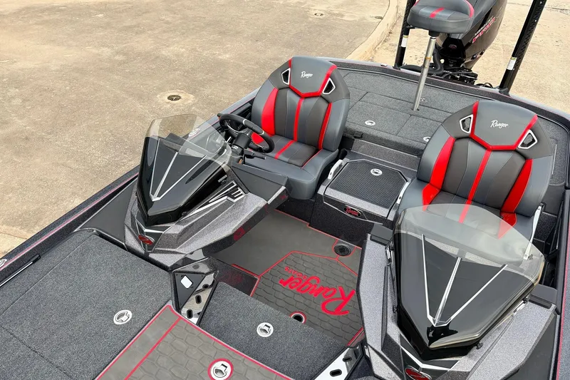 Slide: The Image of 2025 Ranger Z521R Cup-Equipped boat interior with sleek design and comfortable seating. - 30