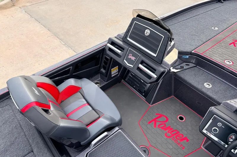 Slide: The Image of 2025 Ranger Z521R Cup-Equipped boat interior with sleek seating and modern dashboard design. - 32