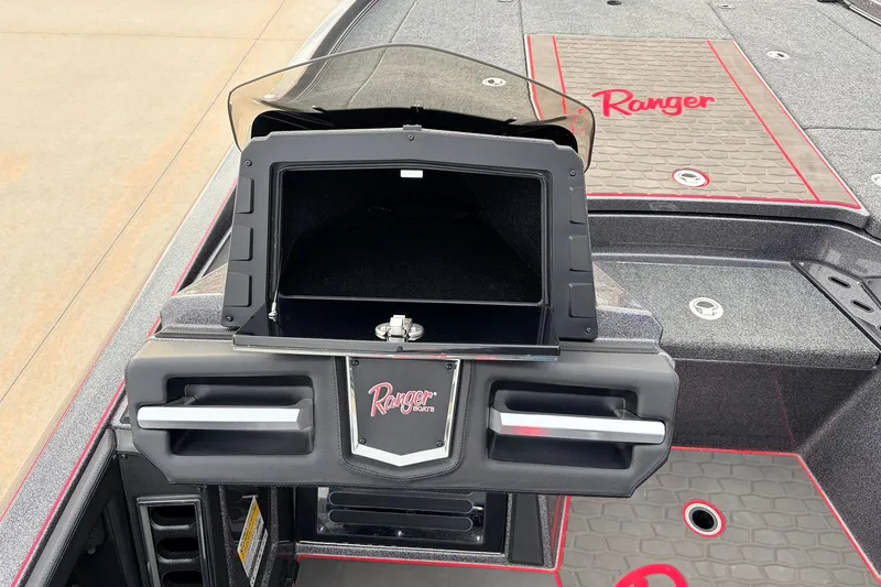 Slide: The Image of 2025 Ranger Z521R Cup-Equipped boat interior with storage compartment and logo detailing. - 34
