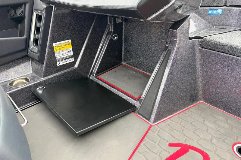 Slide: The Image of 2025 Ranger Z521R Cup-Equipped boat interior with seating and storage features. - 36