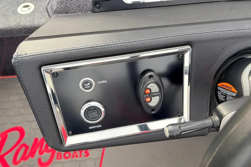 Slide: The Image of Control panel of 2025 Ranger Z521R Cup-Equipped boat with horn and ignition buttons. - 39