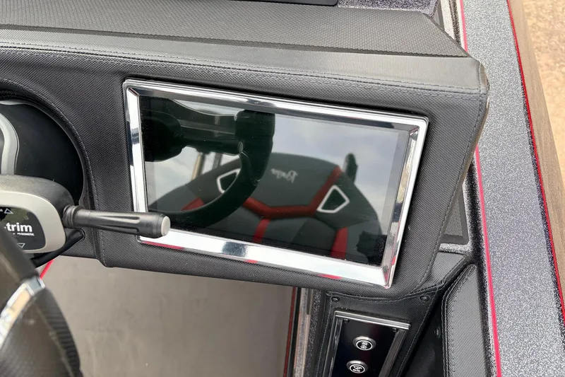 Slide: The Image of 2025 Ranger Z521R Cup-Equipped dashboard with touchscreen and control panel. - 40
