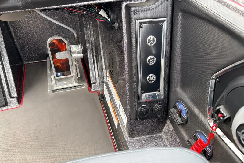 Slide: The Image of 2025 Ranger Z521R Cup-Equipped boat interior with control panel and foot pedal. - 41