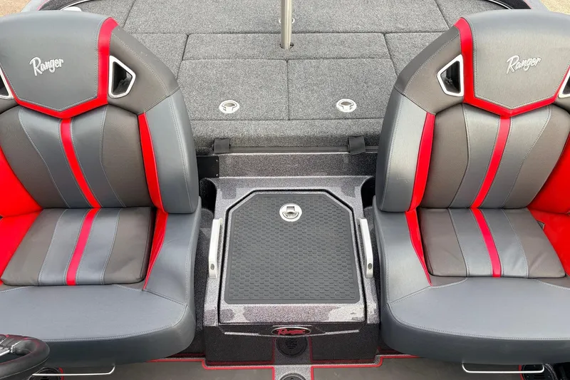 Slide: The Image of 2025 Ranger Z521R Cup-Equipped boat seats with red and gray design. - 42