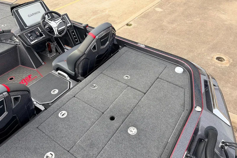 Slide: The Image of 2025 Ranger Z521R Cup-Equipped boat interior with Garmin navigation system and spacious deck. - 46