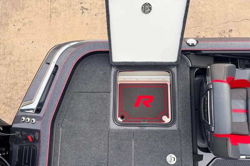 Slide: The Image of 2025 Ranger Z521R Cup-Equipped boat interior with storage compartment and seating. - 52