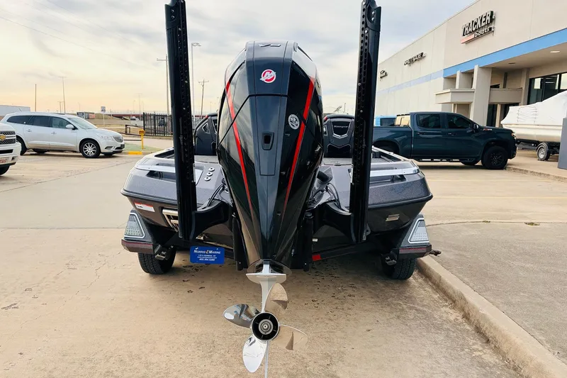 Slide: The Image of 2025 Ranger Z521R Cup-Equipped boat displayed at a dealership parking lot. - 6