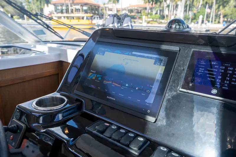 Slide: The Image of Dashboard of 2021 Beneteau Antares 9 with Garmin navigation system. - 21