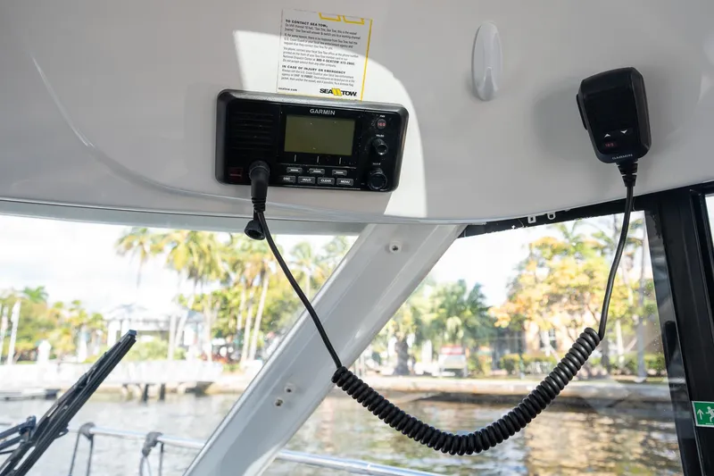 Slide: The Image of Interior view of 2021 Beneteau Antares 9 with Garmin marine radio system. - 25