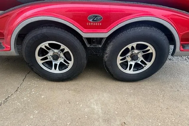 Slide: The Image of 2008 Ranger Z20 Comanche trailer with dual wheels and red fender. - 11