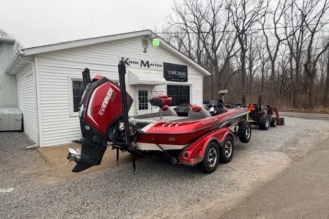 Slide: The Image of 2008 Ranger Z20 Comanche boat with Evinrude motor at Knox Marine dealership. - 2