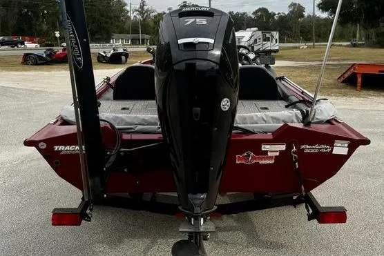 Slide: The Image of 2022 Tracker Pro Team 175 TXW boat with Mercury 75 engine, rear view. - 3