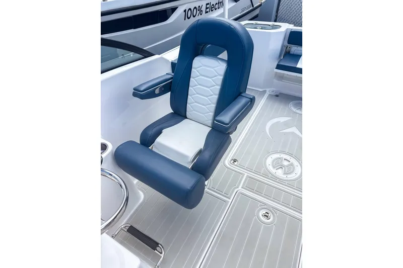 Slide: The Image of 2024 Aquasport AS DC 22 boat seat, blue and white design, modern marine interior. - 12