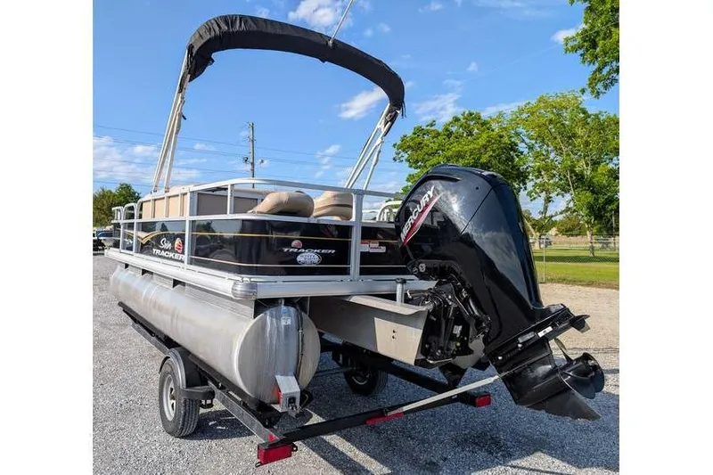 Slide: The Image of 2020 Sun Tracker Bass Buggy 18 Classic pontoon boat with Mercury outboard motor. - 4
