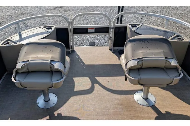 Slide: The Image of 2020 Sun Tracker Bass Buggy 18 Classic Series boat seats and deck view. - 5