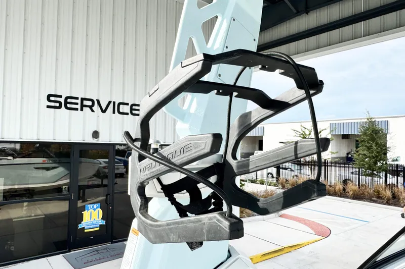 Slide: The Image of 2023 Nautique Super Air Nautique S25 wakeboard rack at service center. - 14