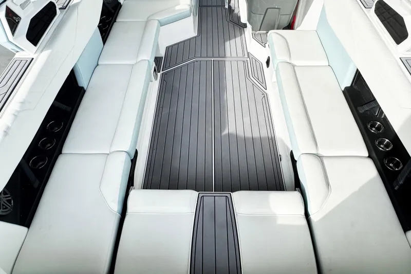Slide: The Image of 2023 Nautique Super Air Nautique S25 interior with sleek seating and modern design. - 6