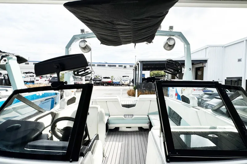 Slide: The Image of 2023 Nautique Super Air Nautique S25 interior with modern design and spacious seating. - 9