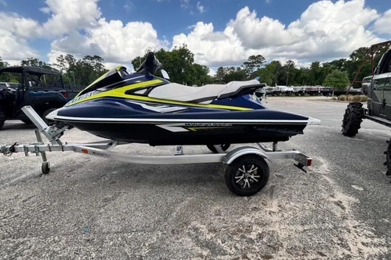 Slide: The Image of 2020 Yamaha WaveRunner VX Deluxe on trailer, parked outdoors under cloudy sky. - 4