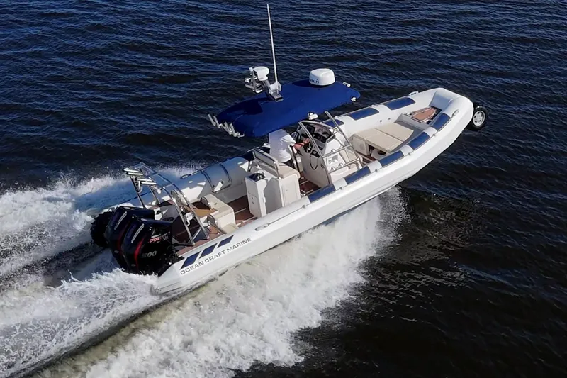 Slide: The Image of 2023 Ocean Craft 38 boat cruising on open water, showcasing speed and agility. - 3