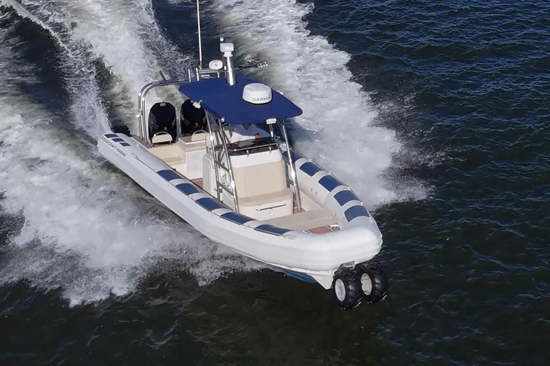 Slide: The Image of 2023 Ocean Craft 38 boat cruising on water, showcasing speed and design. - 4