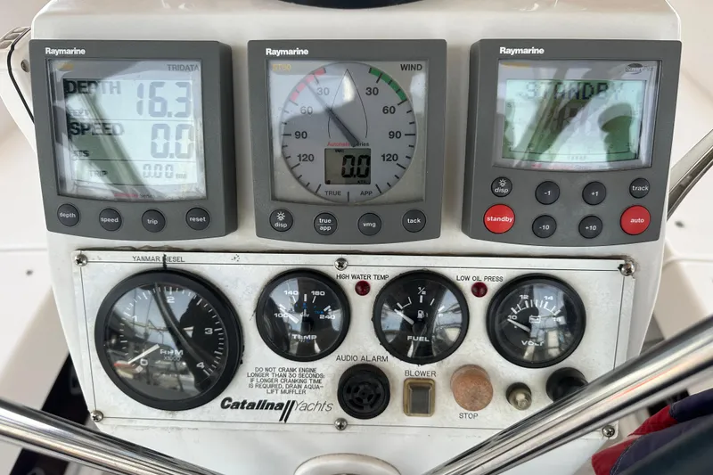 Slide: The Image of Control panel of a 2006 Catalina 387 yacht with Raymarine instruments. - 12