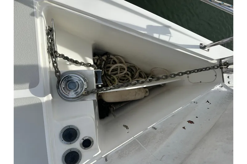 Slide: The Image of Anchor chain and rope storage on 2006 Catalina 387 sailboat deck. - 16