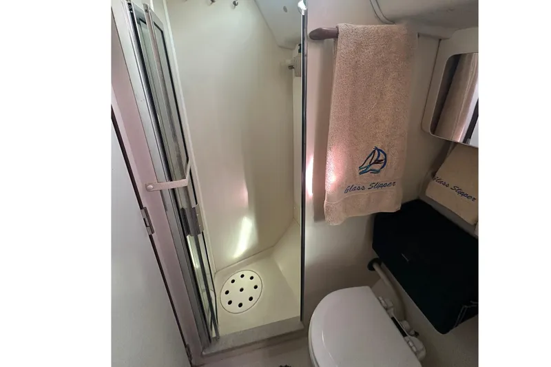 Slide: The Image of Bathroom interior of 2006 Catalina 387 yacht with shower and embroidered towels. - 47